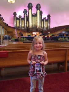 Geneveve in front of the tabernacle organ