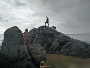 The girls climbing the sea rocks